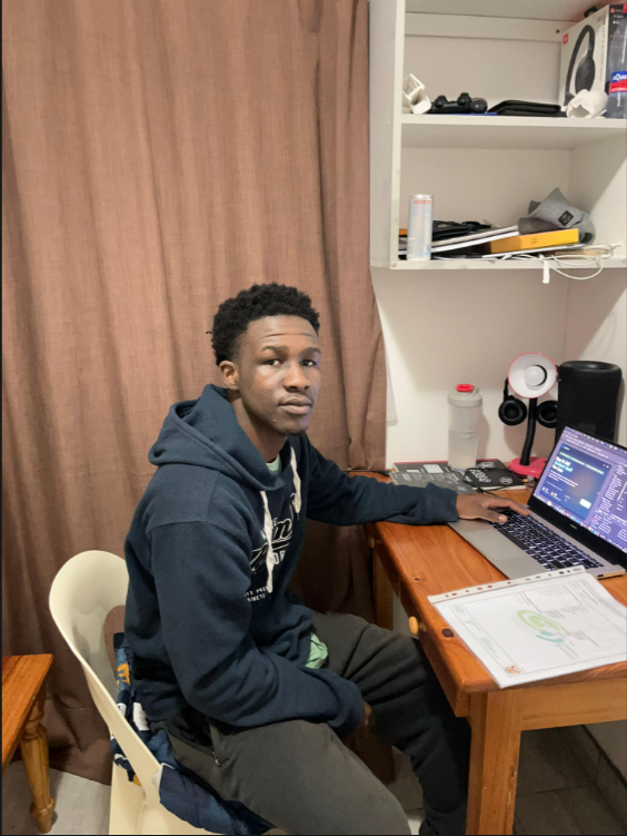 Radebe Nkosikhona working on a web development project